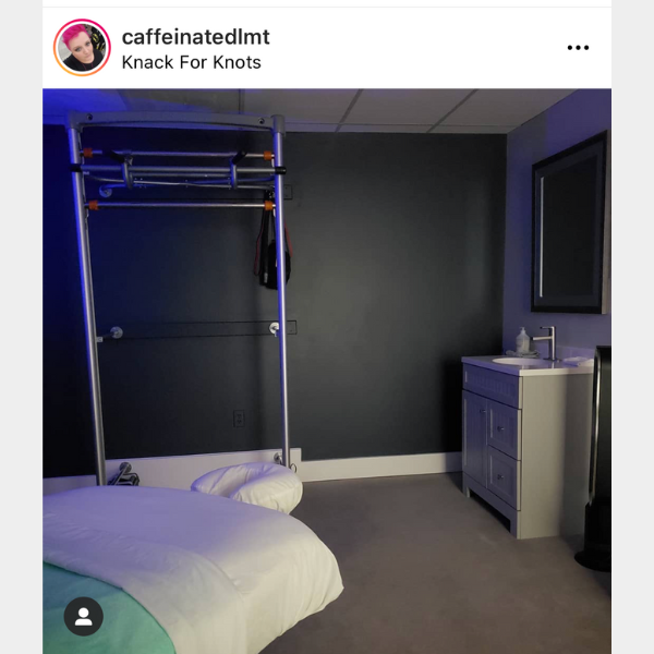 massage room with personal training wall gym equipment including adjustable height pull up bar and dip bar home exercise equipment by solostrength