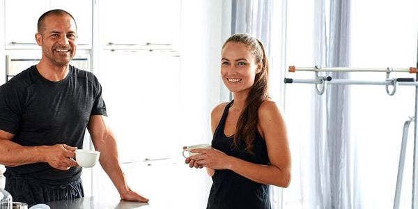 solostrength home exercise equipment michael and praise in kitchen discussing workout