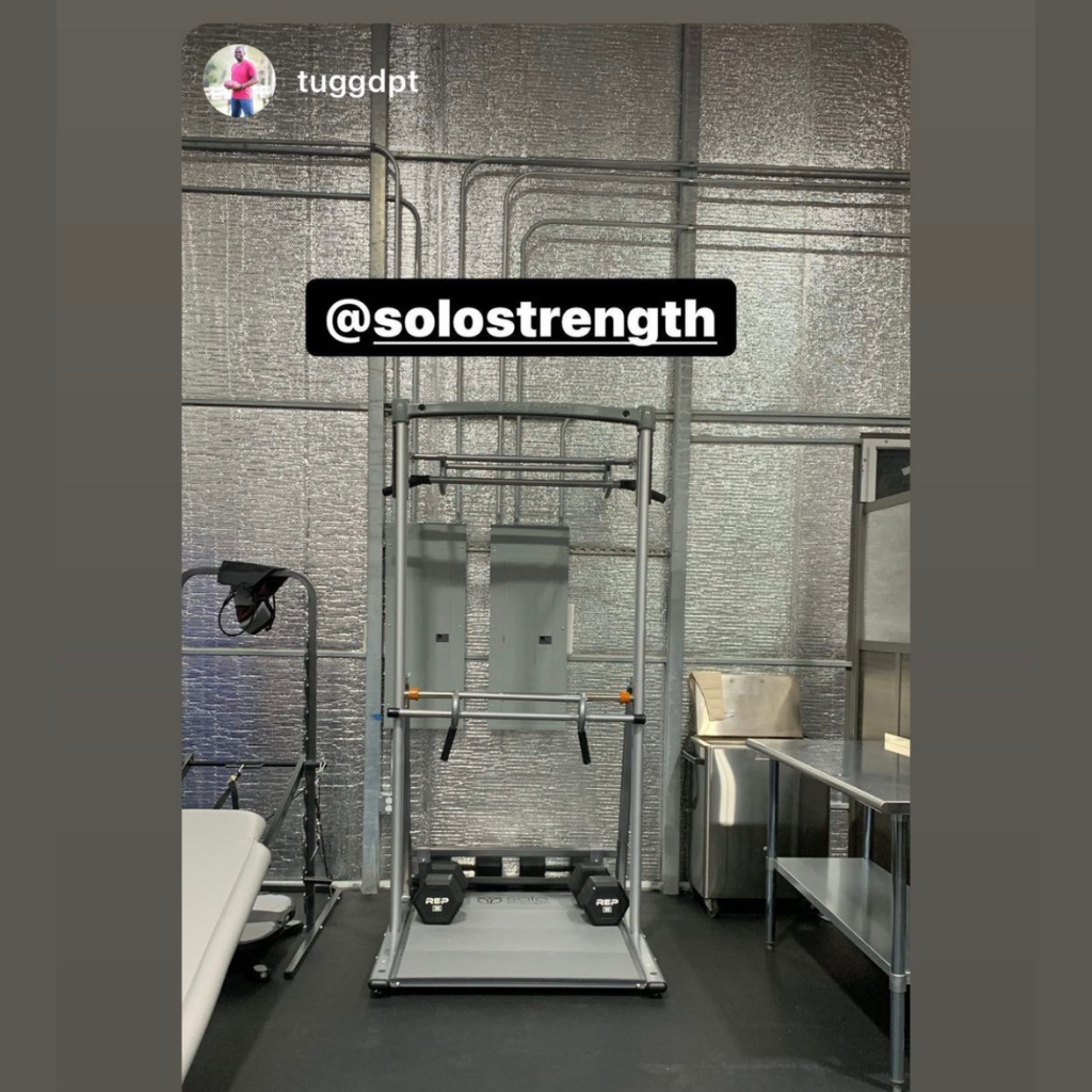 personal training facility with bodyweight functional training power tower adjustable pull up dip station for assisted bodyweight exercise