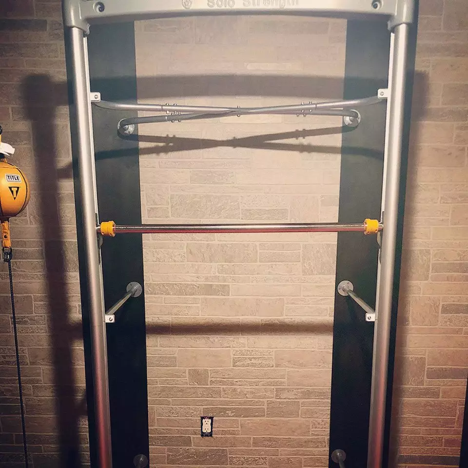 Wall mounted adjustable pull up bar by solostrength